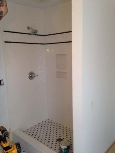 New tile has been laid in this walk-in shower for a home in Erie, PA.