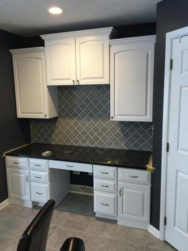 New cabinets above this desk place make this the perfect work space in this new kitchen, designed and installed by Braendel Services.