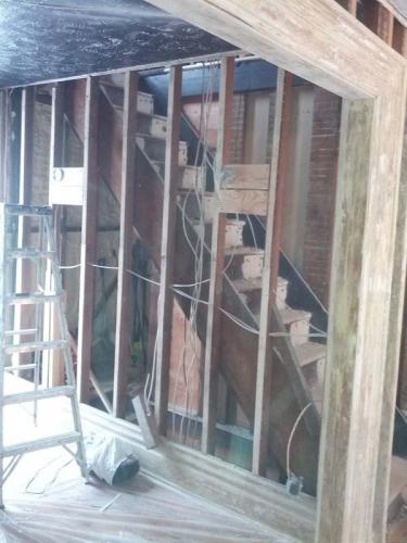 The inside of a home addition that still needs walls and floors. 