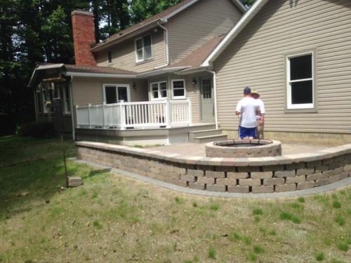 Update your yard by partnering with Braendel to build custom features such as this beautiful firepit. 