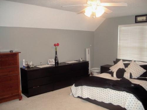 New paint on the walls (light gray) and ceiling (white) freshen up this bedroom.