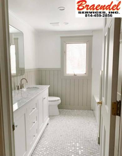 This finished custom bathroom is bright and beautiful thanks to the talented team at Braendel!