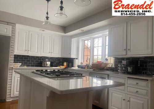 The focal point of this custom kitchen is this gorgeous marble island!