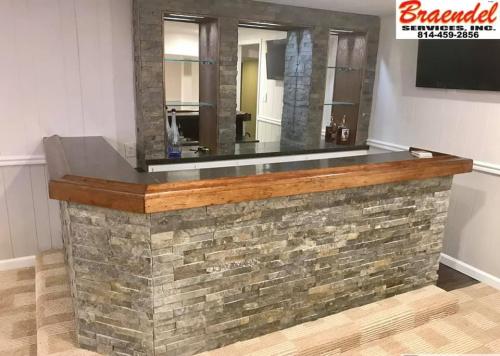 Custom work, such as this built-in bar, are one of the many things you can have Braendel install in your home or business. 