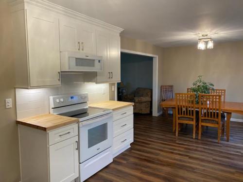 Braendel opened up this galley-style kitchen to the dining room and spruced it up with wood-look vinyl flooring. 