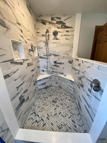 Braendel Services specializes in custom tile showers and modern bathroom designs